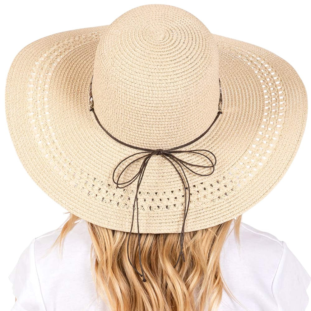 Beige Wide Brim Straw Sun Hat with Evil Eye and Multi Design Band offers stylish sun protection with its unique evil eye and multi-design band. Its wide brim provides ample shade while the evil eye brings a touch of charm. Stay safe from the sun while adding a fashionable touch to your outfit. 