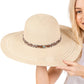 Beige Wide Brim Straw Sun Hat with Evil Eye and Multi Design Band offers stylish sun protection with its unique evil eye and multi-design band. Its wide brim provides ample shade while the evil eye brings a touch of charm. Stay safe from the sun while adding a fashionable touch to your outfit. 
