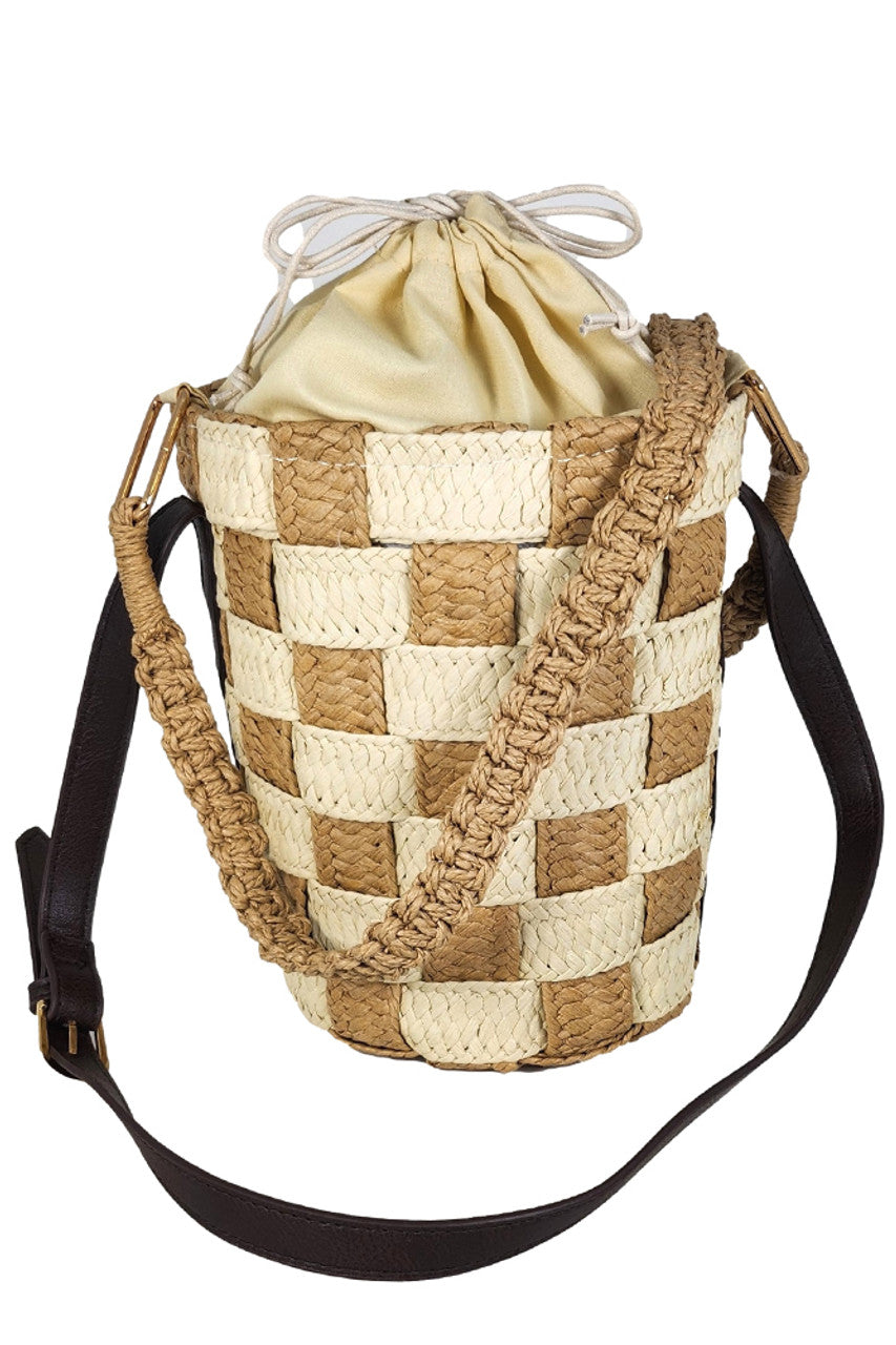 Straw Weaved Bucket Bag showcases expert craftsmanship with its tightly woven natural straw fibres, delivering both durability and lightweight ease. Its spacious bucket design offers practical storage while maintaining an elegant, relaxed aesthetic. Perfect for elevating summer ensembles, this bag blends functionality with refined style for versatile everyday use. 