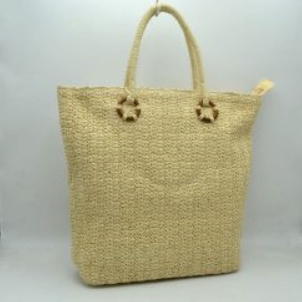 Bige This everyday tote bag features a distinct textured woven body with a spacious main compartment designed to accommodate daily essentials. The bag is secured by a top zipper closure with an extended pull tab, ensuring all belongings remain safe. Two rounded top handles are attached to the front and back panels using decorative circular accent loops, offering a comfortable grip for hand or arm carrying.