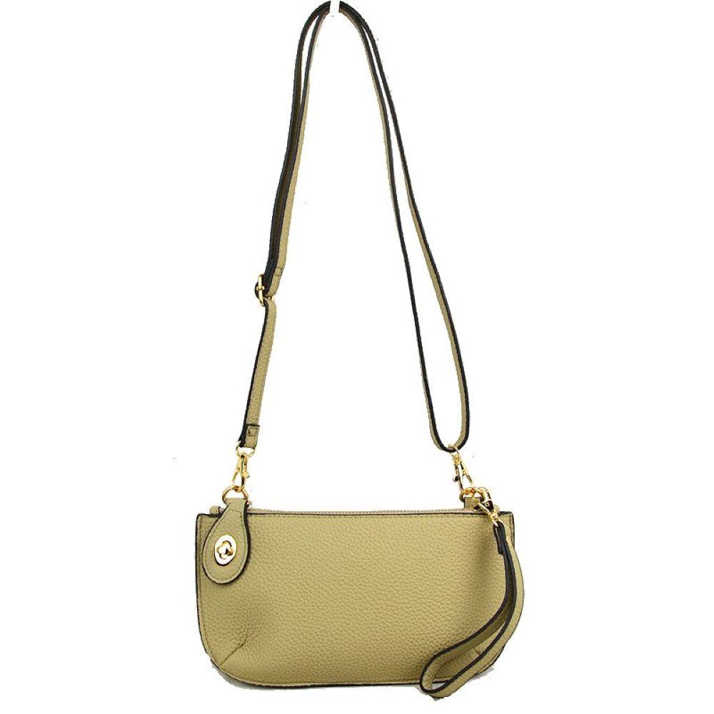 Beige This versatile everyday bag features a compact pebbled textured body with a slightly curved base silhouette. Designed for organized daily or evening use, the main storage compartment is secured by a top zipper closure and accented with a small decorative metallic turn-lock detail on the side panel. It offers multiple carrying options, equipped with a long, adjustable crossbody shoulder strap and a shorter matching wristlet loop