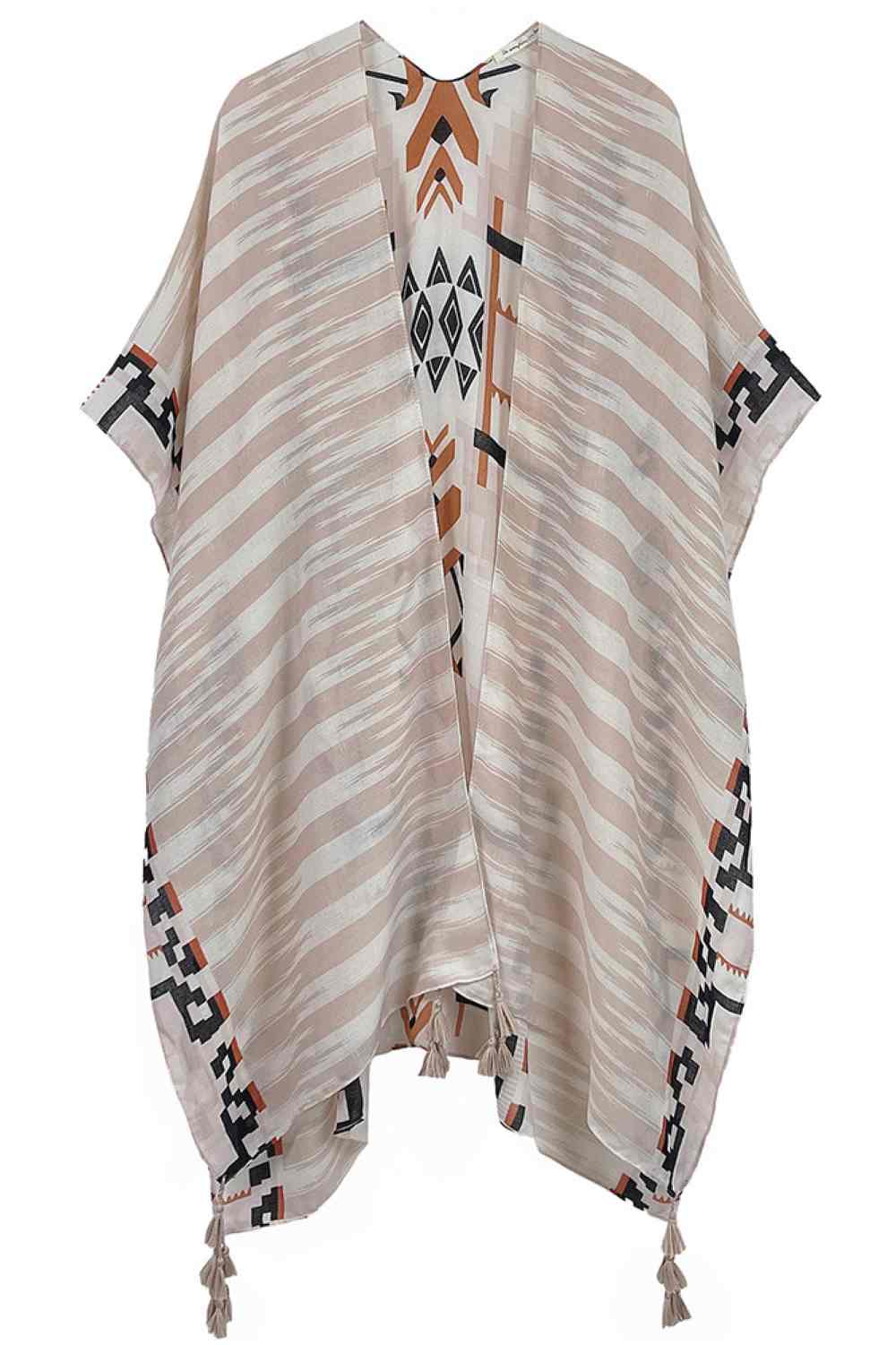 Beige Embrace bohemian style with this striking Aztec Pattern Print Tassel Kimono. Crafted from lightweight 100% polyester, this versatile piece features bold geometric patterns inspired by traditional Aztec designs, complete with decorative tassels for added flair. Perfect for layering over dresses, swimwear, or casual outfits, it offers effortless coverage and movement. With generous dimensions of 35.4" x 35.4", it drapes beautifully on most body types. Ideal for beach days, festivals, or relaxed everyday