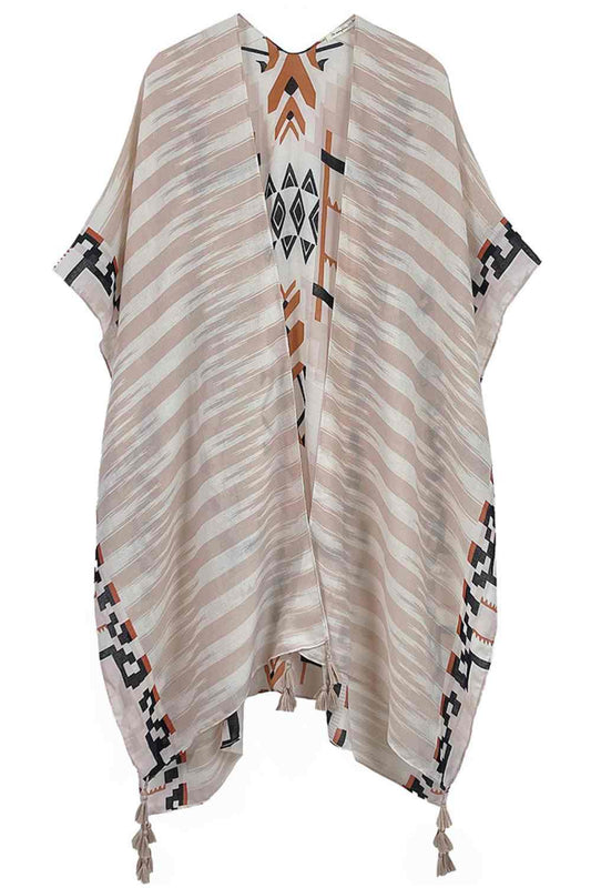 Beige Embrace bohemian style with this striking Aztec Pattern Print Tassel Kimono. Crafted from lightweight 100% polyester, this versatile piece features bold geometric patterns inspired by traditional Aztec designs, complete with decorative tassels for added flair. Perfect for layering over dresses, swimwear, or casual outfits, it offers effortless coverage and movement. With generous dimensions of 35.4" x 35.4", it drapes beautifully on most body types. Ideal for beach days, festivals, or relaxed everyday