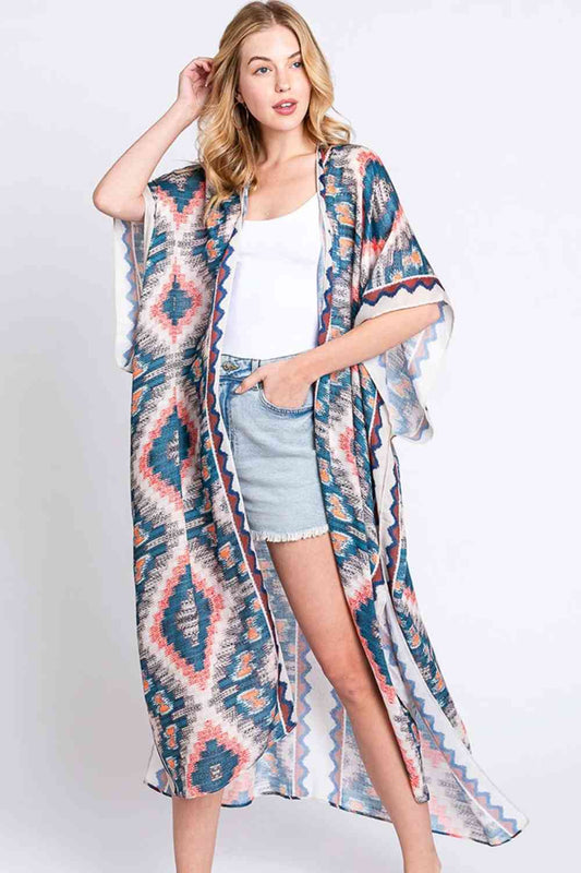 Beige Embrace bohemian elegance with this Aztec Print Open Front Long Kimono. Featuring a striking geometric pattern inspired by traditional Aztec designs, this lightweight piece drapes beautifully over any outfit. The open front silhouette offers effortless layering versatility, while the generous 35" x 47.5" dimensions provide comfortable coverage. Crafted from 100% polyester for easy care and durability. Perfect for adding texture and cultural flair to your everyday wardrobe or beach getaway.