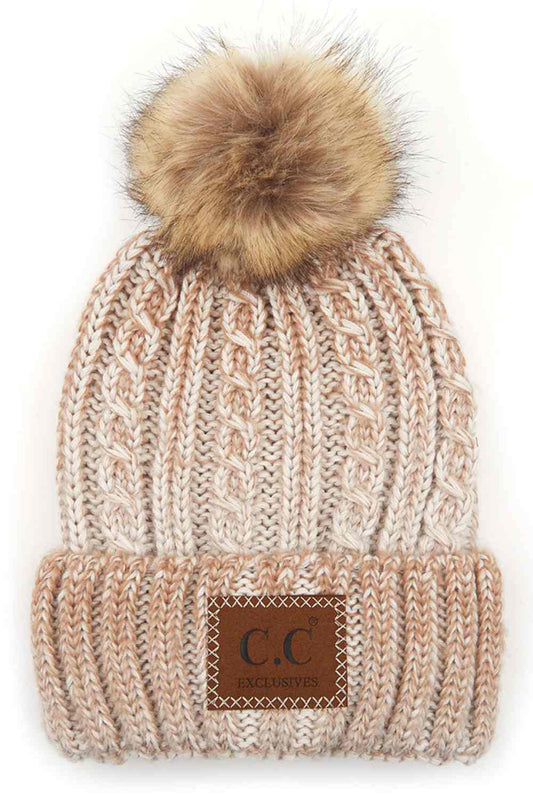 Beige Elevate your winter wardrobe with this C.C ombre beanie featuring a plush faux fur pom. Crafted from 100% acrylic, the soft knit construction provides warmth and comfort without bulk. Perfect for casual outings or layering under winter gear.