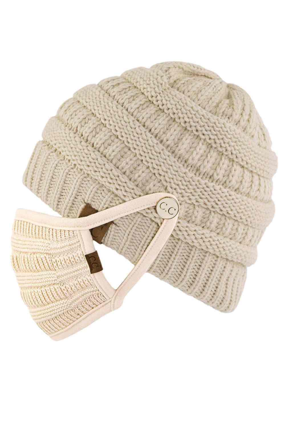 Beige Stay warm and functional with this C.C Ribbed Knit Beanie featuring a convenient button attachment for your mask. Crafted from 100% acrylic, this lightweight beanie offers soft comfort and durability for everyday wear.