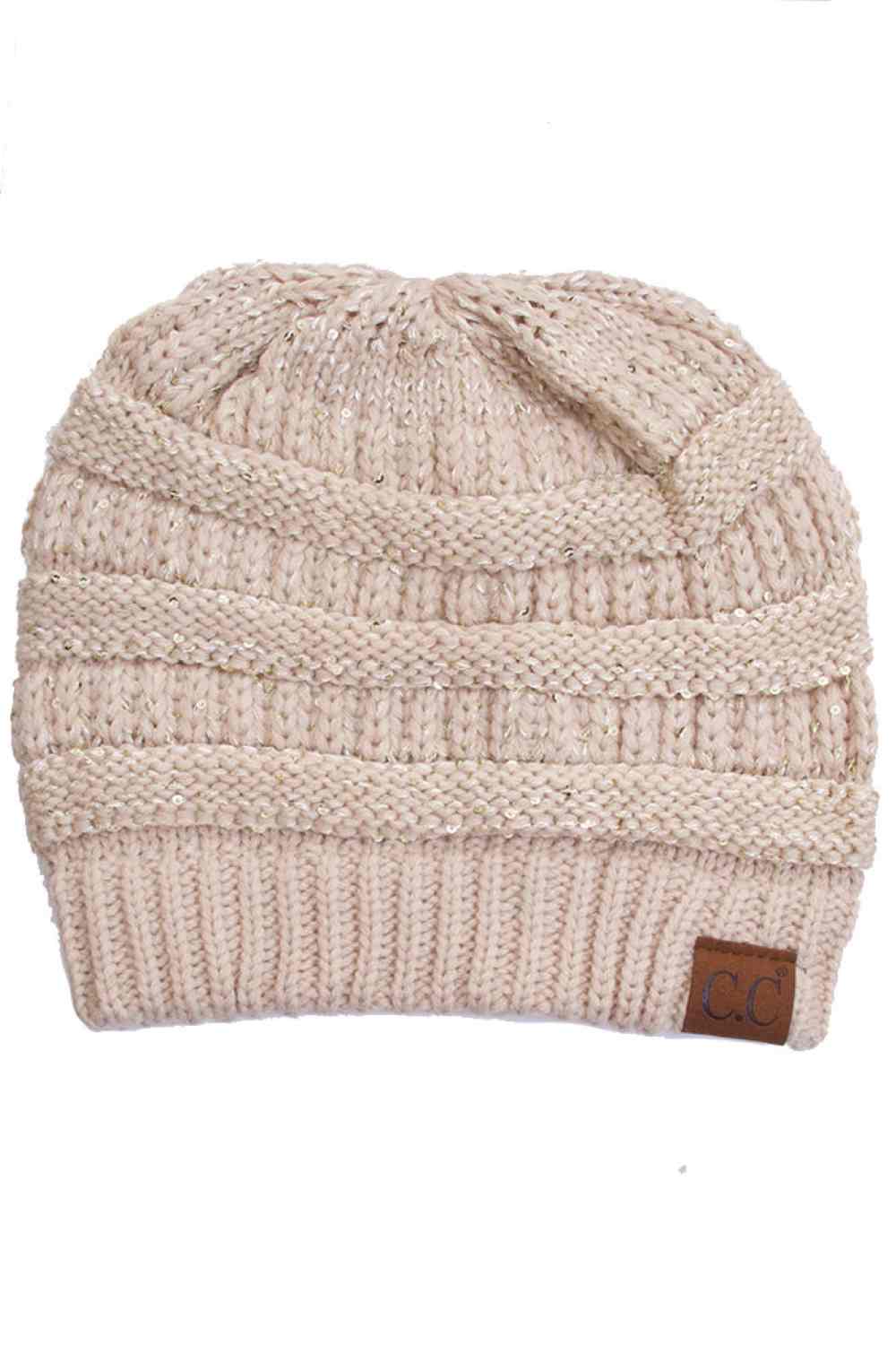 Beige Sparkle through the season with the C.C Sequin Knitted Soft Beanie, where style meets warmth. This cozy 100% acrylic beanie features eye-catching sequin detailing that adds a touch of glamour to your winter look. The soft, lightweight knit construction keeps you comfortable without bulk, perfect for layering or wearing solo. Whether you're heading out for casual errands or outdoor adventures, this versatile beanie transitions effortlessly from day to night. One size fits most for convenient, year-roun