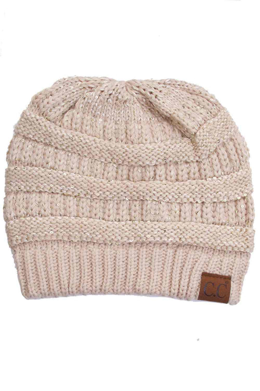 Beige Sparkle through the season with the C.C Sequin Knitted Soft Beanie, where style meets warmth. This cozy 100% acrylic beanie features eye-catching sequin detailing that adds a touch of glamour to your winter look. The soft, lightweight knit construction keeps you comfortable without bulk, perfect for layering or wearing solo. Whether you're heading out for casual errands or outdoor adventures, this versatile beanie transitions effortlessly from day to night. One size fits most for convenient, year-roun