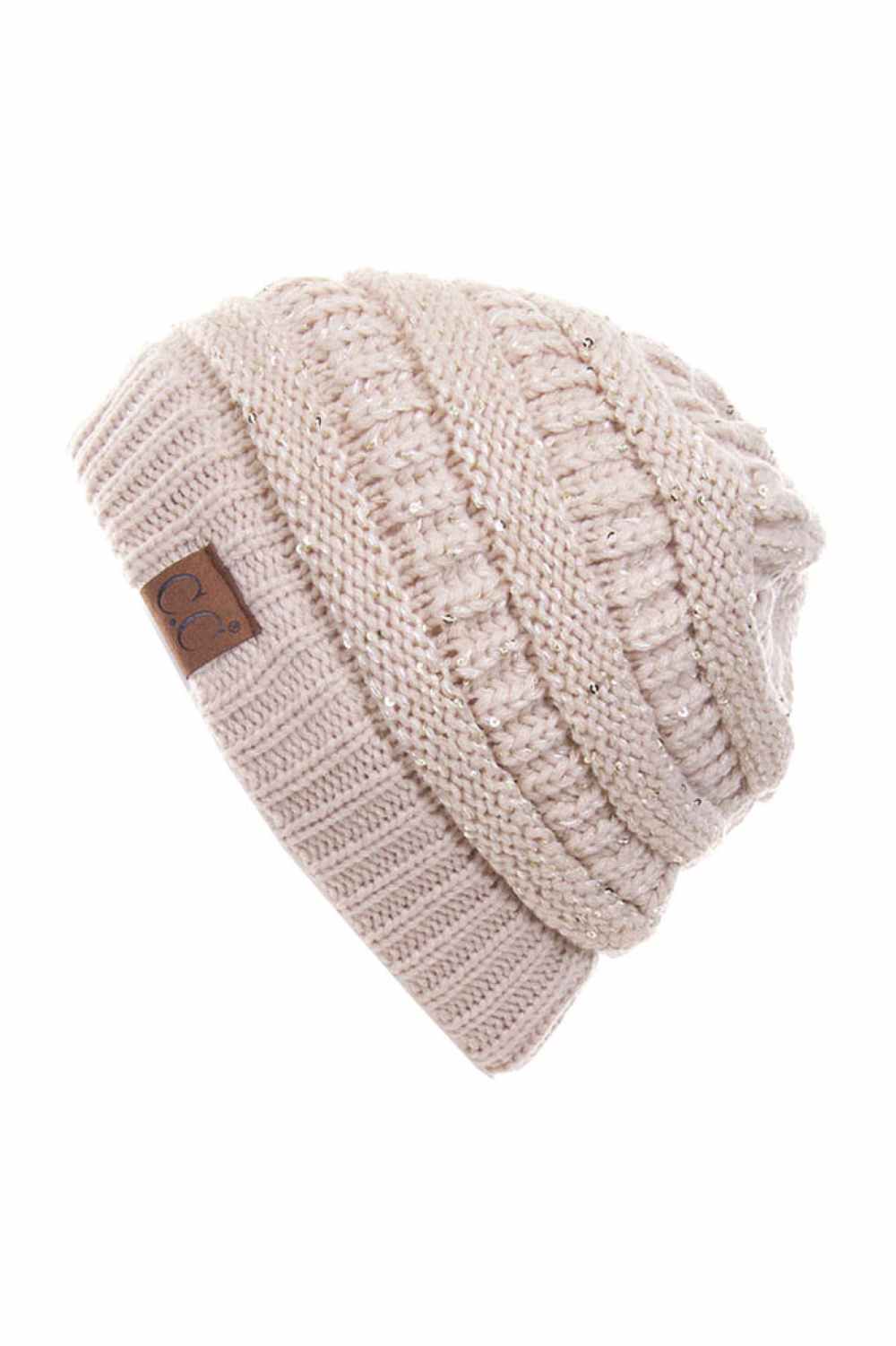 Beige C.C Sequin Ponytail Messy Bun Beanie with open top design lets you pull your hair through for a stylish, effortless look. Crafted from 100% soft acrylic, this cozy beanie keeps you warm while showcasing your ponytail or messy bun. The shimmering sequin detailing adds sparkle and dimension to your winter style. Perfect for casual days, outdoor activities, or layering under jackets. One size fits most for comfortable, versatile wear that works with any outfit.