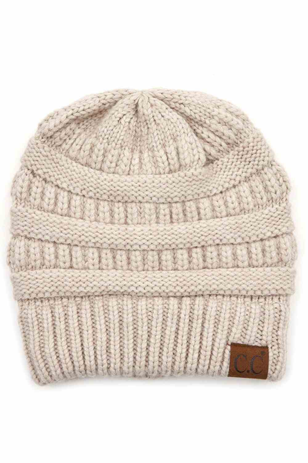 Beige Wrap yourself in softness with this C.C Soft Yarn Knit Beanie, crafted from a premium blend of 47% rayon, 31% PBT, and 22% nylon. The luxurious rayon provides a silky feel against your skin, while the durable synthetic fibers ensure lasting wear through winter season.
