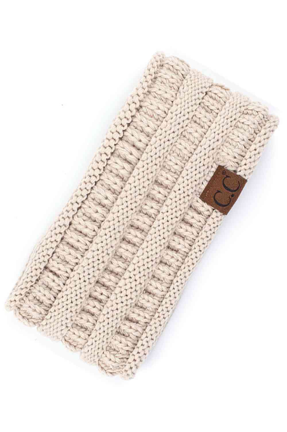 Beige Elevate your everyday style with the C.C Solid Ribbed Headwrap. Crafted from 100% acrylic, this versatile headwrap features a classic ribbed texture that adds dimension and visual interest. One size fits most, making it the perfect accessory for any occasion—whether you're running errands, hitting the gym, or making a fashion statement. Made in Korea with quality craftsmanship you can trust. Comfortable, durable, and effortlessly chic.