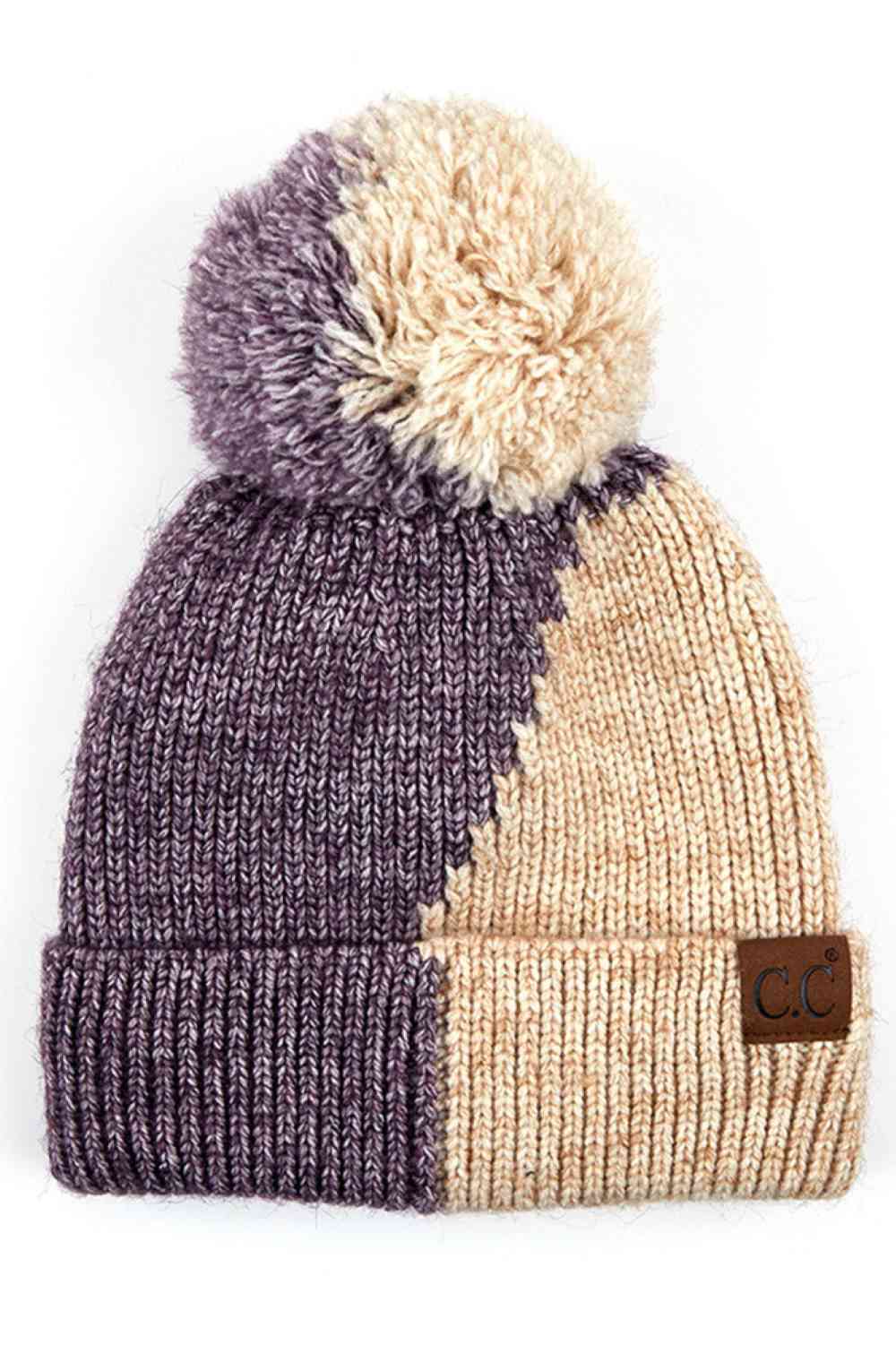 Beige Elevate your winter wardrobe with the C.C Dual Color Knit Beanie featuring a charming pom-pom accent. Crafted from 100% soft acrylic, this two-tone design combines comfort with contemporary style. The versatile knit construction provides warmth without excess bulk, making it ideal for layering under hoods or wearing solo. The playful pom-pom adds a touch of personality to any cold-weather look. One size fits most for effortless, all-season wear that transitions seamlessly from casual outings to outdoo