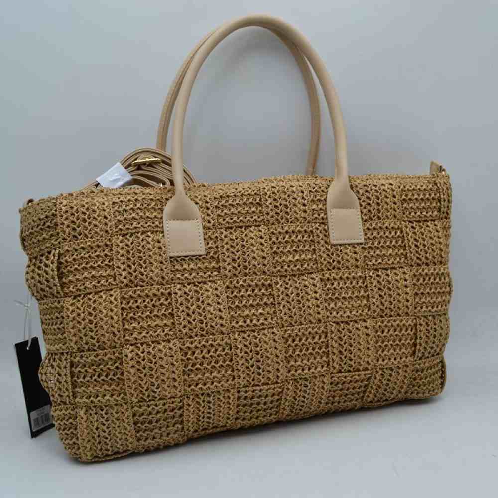 Beige Embrace effortless summer style with this beautiful woven straw tote bag. Perfect for beach days, farmers' market runs, or casual brunch dates, this bag combines a rustic, natural aesthetic with modern functionality.