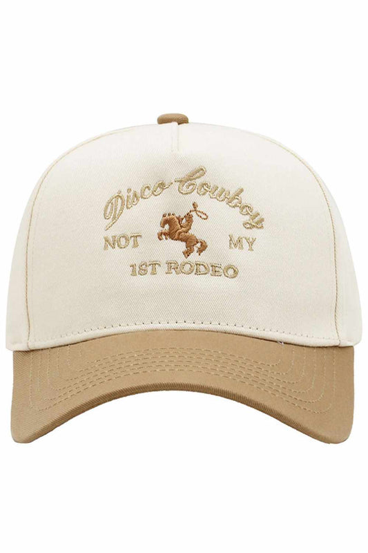 Beige Step into retro vibes with this DISCO COWBOY embroidered baseball cap. Featuring bold lettering on a classic two-tone design, it's the perfect statement piece for music lovers and vintage enthusiasts. Crafted from 100% cotton for breathable comfort all day long. One size fits most. Made in China.