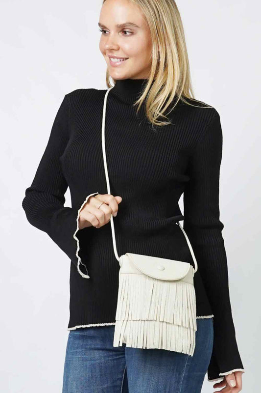 Beige Elevate your everyday style with this Double Layered Fringe Mini Crossbody Bag. Crafted from durable 100% polyester, this compact bag features eye-catching double-layered fringe detailing that adds movement and texture to any outfit. Perfect for hands-free carrying, the adjustable crossbody strap keeps your essentials secure while you're on the go. One size fits all, making it a versatile accessory for casual outings, festivals, or weekend adventures. A playful statement piece that combines function w