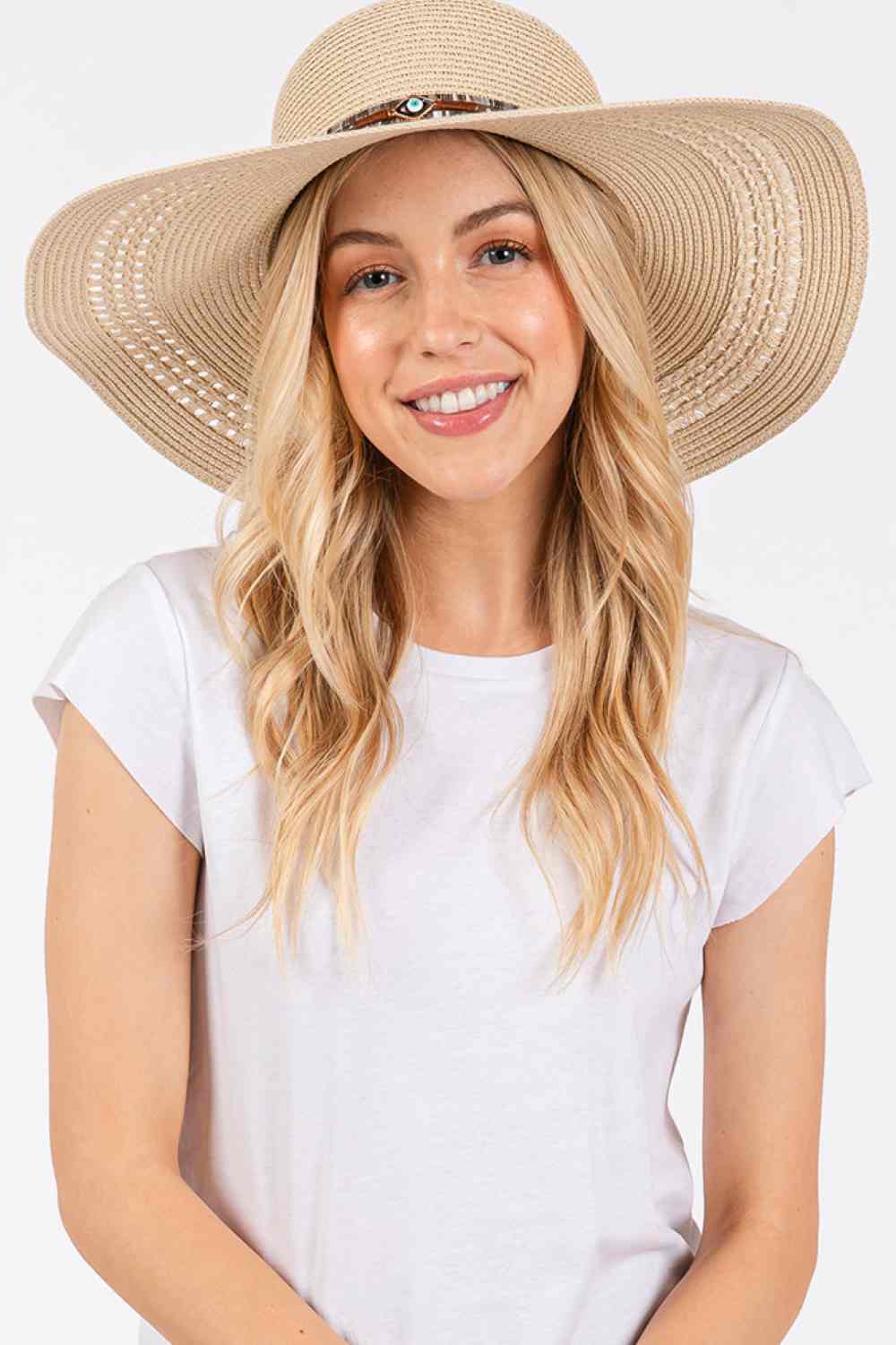 Beige Stay protected from the sun in style with this wide-brim straw hat featuring an eye-catching evil eye and multi-design band. Crafted from 100% paper material, the 5" brim delivers excellent UV protection while the lightweight construction keeps you cool during summer outings.