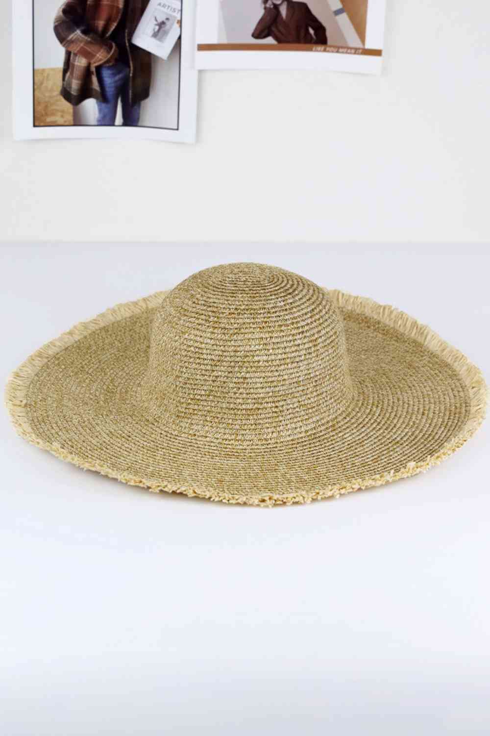 Beige Elevate your warm-weather wardrobe with this charming Frayed Two Tone Mixed Color Straw Floppy Hat. Crafted from 100% paper, this lightweight hat delivers breathable comfort perfect for extended outdoor wear. Ideal for beach days, garden parties, or casual summer outings, this versatile hat pairs beautifully with any warm-weather ensemble.