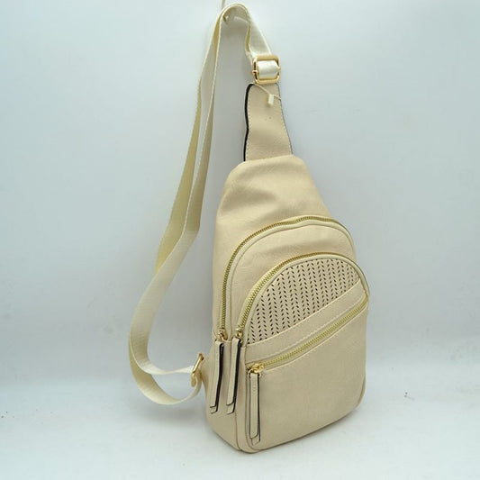 Beige This versatile sling bag features an asymmetric silhouette decorated with an arched, perforated pattern on the front panel, making it suitable for everyday use. It offers multiple organized storage compartments, including a main curved section, a mid-sized front zippered pouch, and a smaller diagonal zippered pocket near the base, all equipped with elongated pull tabs. Designed for convenience, the bag is completed with a single wide