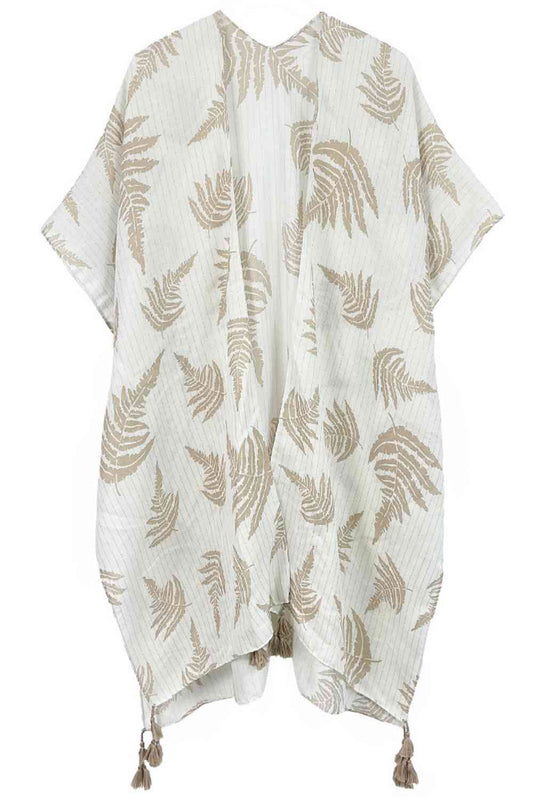 Beige Effortless elegance meets bohemian charm with this stunning leaf print kimono. Crafted from lightweight polyester, it features a sophisticated two-tone design accented with shimmering lurex threading and playful tassels at the hem. The generous 35.4" x 35.4" dimensions provide a relaxed, flowing fit perfect for layering over any outfit. Whether you're heading to the beach, a casual brunch, or an evening out, this versatile piece transitions seamlessly from day to night. A wardrobe essential that bring