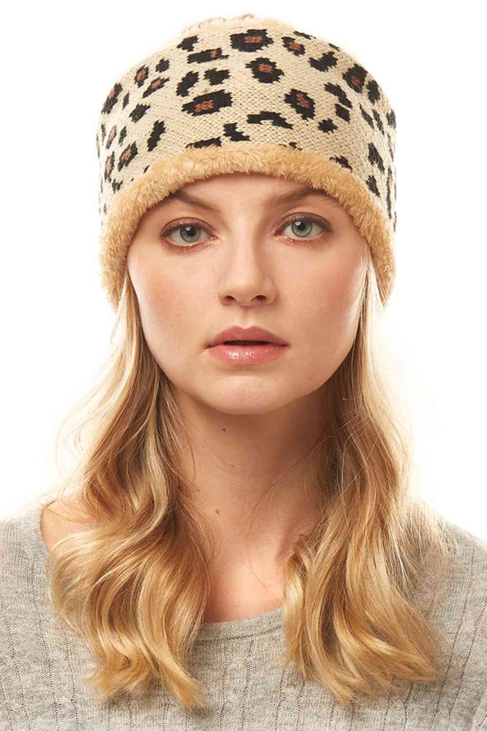Beige Stay stylish with this eye-catching Leopard Print Headband. Crafted from a comfortable blend of 50% polyester and 50% acrylic, this versatile accessory measures 4" x 10" and fits one size. Perfect for keeping hair in place while adding a bold fashion statement to any outfit. Whether you're heading to the gym, running errands, or just want an instant style upgrade, this headband delivers both function and flair.