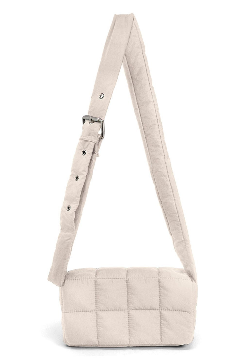 Beige Compact quilted puffer crossbody bag with a sleek, modern design. Measures 8.7" x 4.7" with a 2.4" depth, perfect for carrying essentials while keeping your hands free. The padded construction offers durability and a soft touch. Ideal for everyday outings, travel, or casual errands.