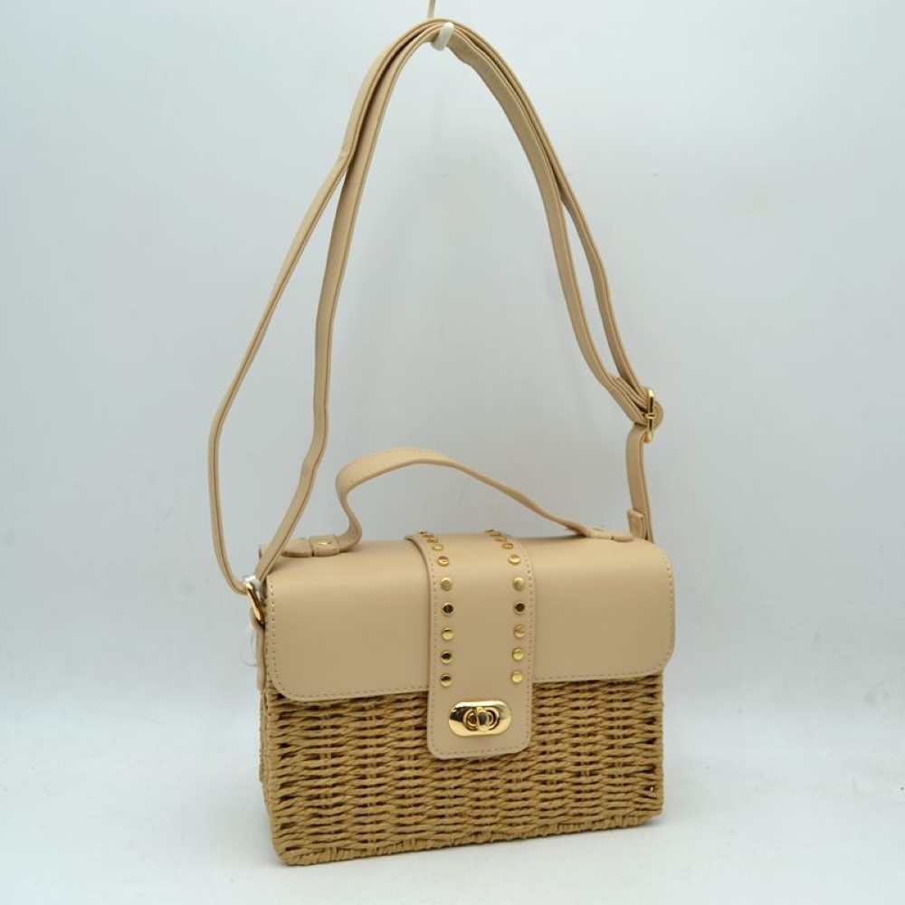 Beige Embrace warm-weather sophistication with this beautiful mixed-media shoulder bag. Effortlessly blending the rustic, organic charm of a woven straw basket body with a smooth, structured faux-leather flap enclosure, this bag is a must-have accessory for casual sunny days, resort vacations, or stylish weekend brunches. Its elegant silhouette offers a refined twist on classic beachwear aesthetics, transitioning perfectly from a day in the sun to an evening out.
