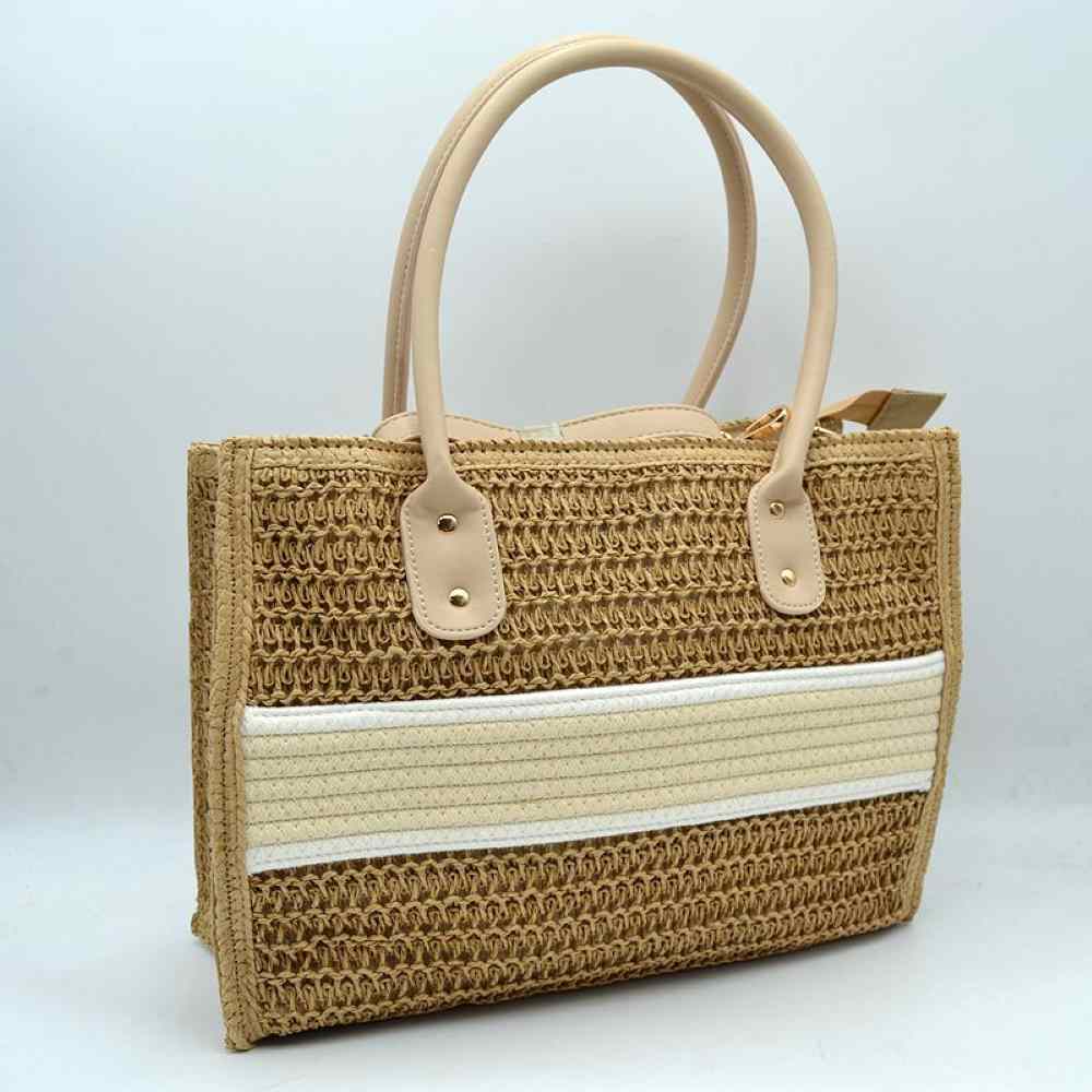 Beige Embrace carefree, sunny days with this beautifully crafted woven tote bag, the perfect companion for beach getaways, weekend markets, or casual summer strolls. Featuring an open-weave textured body, this handbag is elegantly detailed with a smooth, contrasting horizontal stripe across the center that brings a polished, modern edge to its natural aesthetic. It comes equipped with structured, rounded top handles secured by gleaming metallic rivets 