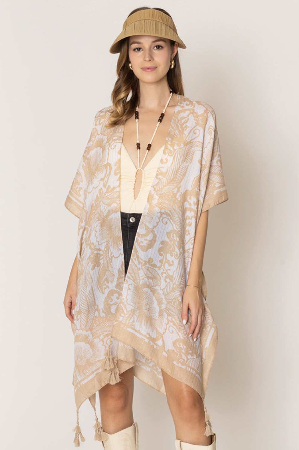 Beige Effortless elegance meets versatile style with this Two Tone Mixed Pattern Print Kimono. Crafted from lightweight 100% polyester, this piece drapes beautifully and moves with you throughout your day. The mixed pattern design in complementary tones adds visual interest to any outfit, whether layered over basics or worn as a statement piece. Perfect dimensions at 35.4" x 35.4" provide comfortable coverage and flattering drape. An easy-to-wear essential that transitions seamlessly from casual to dressed-