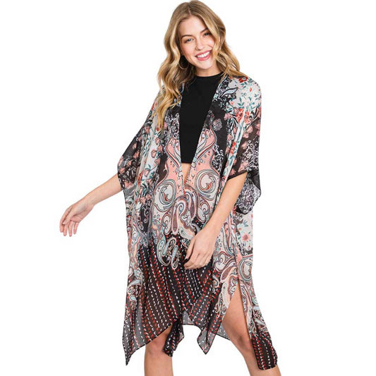 Black Abstract Paisley Flower Print Kimono Poncho, Expertly crafted with an abstract paisley print, this kimono poncho is a versatile addition to any wardrobe. Made with lightweight, breathable material, it's perfect for layering over any outfit for a chic look. Enjoy the unique design and comfortable fit of this piece.