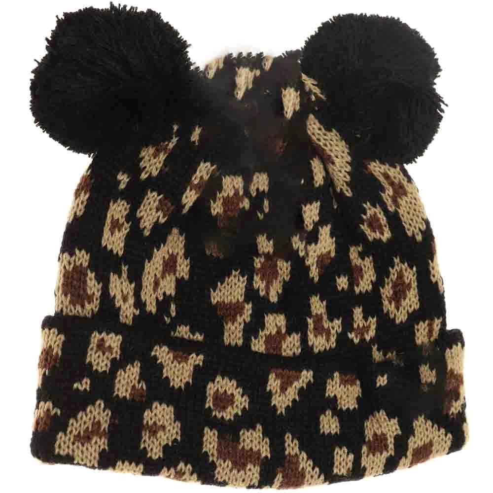 Black Baby Leopard Double Pom Beanie combines warmth and playful design for your little one. Made with a soft, gentle fabric, it ensures cozy comfort while the double pom detailing adds a charming, stylish flair. The subtle leopard print delivers a trendy look, making this beanie an ideal accessory for cold weather protection with a fashionable edge. 