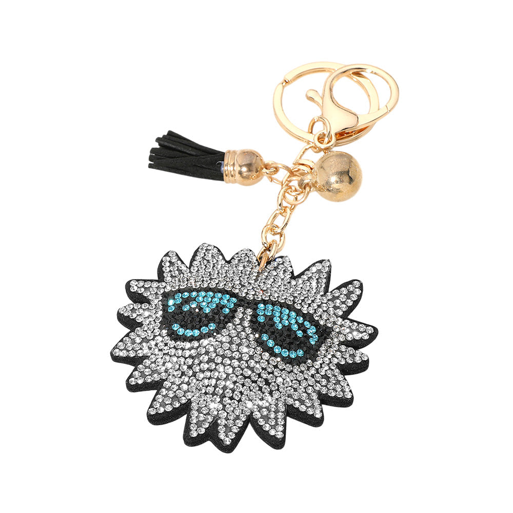 Black Bling Studded Sunglasses on a Sunburst Tassel Keychain are the perfect accessory for any fashion-forward individual. With their stylish design and intricate studded details, these sunglasses will make you stand out from the crowd. The sunburst tassel keychain adds a unique touch to this already eye-catching product. Stay on trend and make a statement with these sunglasses and keychain combo. 