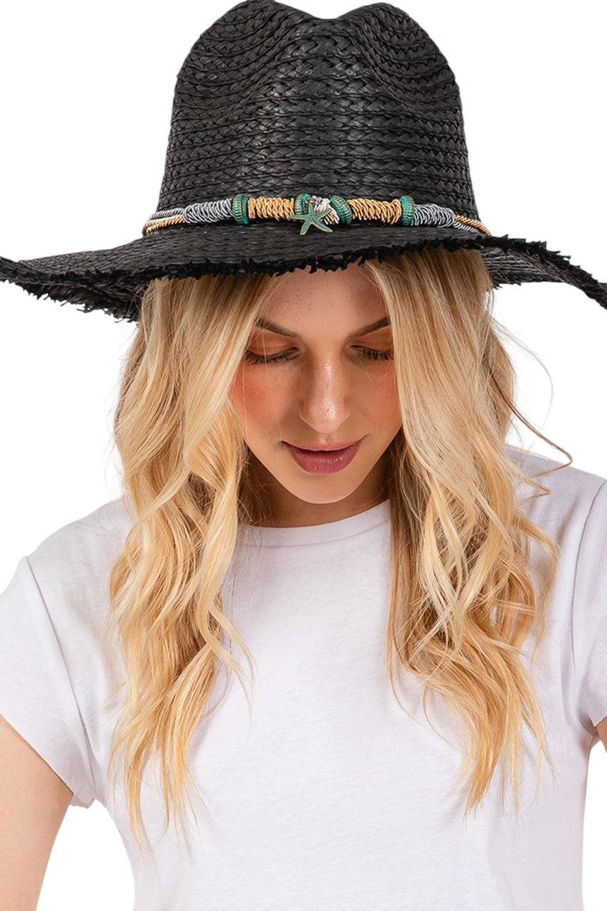 Black Braided Starfish Band Frayed Straw Summer Sun Hat features a distinctive braided starfish band and stylish frayed edges. The wide brim provides optimal UV protection while maintaining breathability, making it an essential accessory for beach outings, resort wear, or any outdoor summer activity. Lightweight construction ensures all-day comfort.