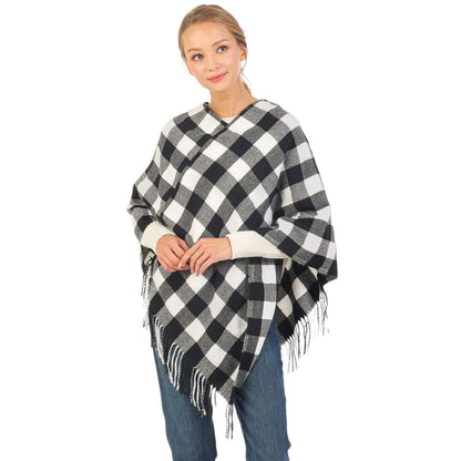 Black Buffalo Plaid Pattern Soft Poncho, is perfect for making a fashion statement in the cold times. The unique pattern combines classic buffalo plaid with a modern look. Crafted of lightweight materials, it features a full-length design for an effortless style, making it a great winter gift. 