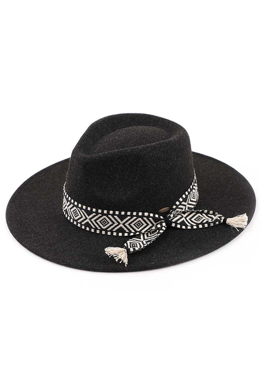 Black-C.C Aztec Trim Vegan Felt Panama Hat is a must-have accessory for any fashion-forward individual. Made with 100% vegan felt, this hat is not only stylish but also eco-friendly. The Aztec trim adds a unique touch, making it a statement piece for any outfit. Stay on-trend and feel good about your fashion choices with this panama hat.