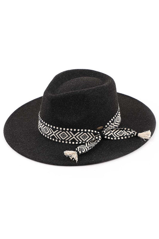 Black-C.C Aztec Trim Vegan Felt Panama Hat is a must-have accessory for any fashion-forward individual. Made with 100% vegan felt, this hat is not only stylish but also eco-friendly. The Aztec trim adds a unique touch, making it a statement piece for any outfit. Stay on-trend and feel good about your fashion choices with this panama hat.