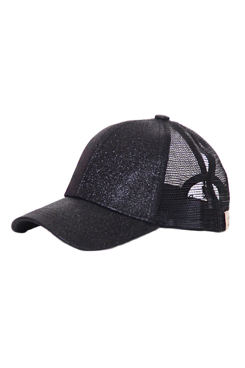 Black C.C Baseball Ponycap combines classic baseball cap style with a convenient ponytail opening, offering both comfort and functionality. Crafted from breathable materials, it ensures all-day wearability while accommodating various hair types and styles. Ideal for active lifestyles, this cap provides sun protection without compromising on style or practicality. 