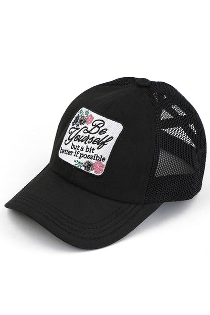 Black C.C BE YOURSELF PATCH CRISS CROSS PONY CAP is both stylish and practical. With a unique criss-cross design and a "Be Yourself" patch, this cap is perfect for any fashion-forward individual. The pony cap style also allows for comfortable and convenient wear. Express yourself with this versatile and trendy accessory.