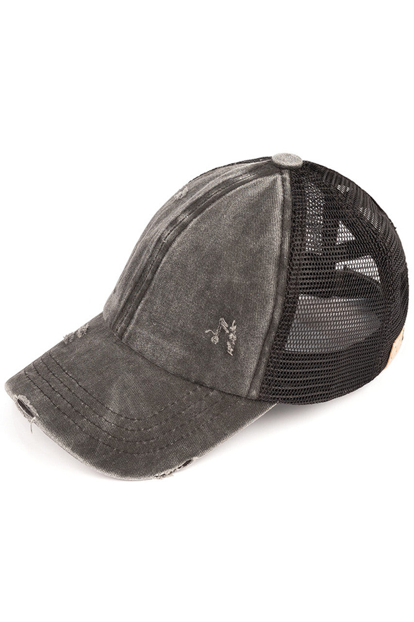 Black C.C Kids Baseball Pony Cap combines classic sporty style with practical design tailored for children. Featuring an adjustable strap for a secure fit and a ponytail opening, it offers comfort and convenience for active kids. Crafted from durable materials, this cap provides sun protection while allowing breathability, making it ideal for outdoor play and sports activities. Its versatile design complements casual outfits, ensuring your child stays stylish and comfortable throughout the day. 