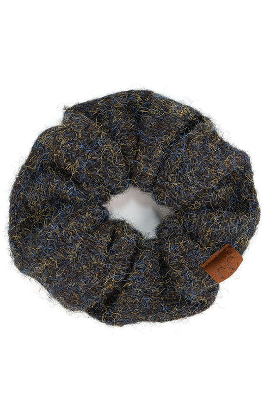 Black C.C. Multi Yarn Knit Solid Color Soft Scrunchies are the perfect addition to any hairstyle. Made with a blend of soft, durable yarn, they provide a comfortable and secure hold without pulling or damaging your hair. Available in a variety of solid colors, they are versatile and stylish.