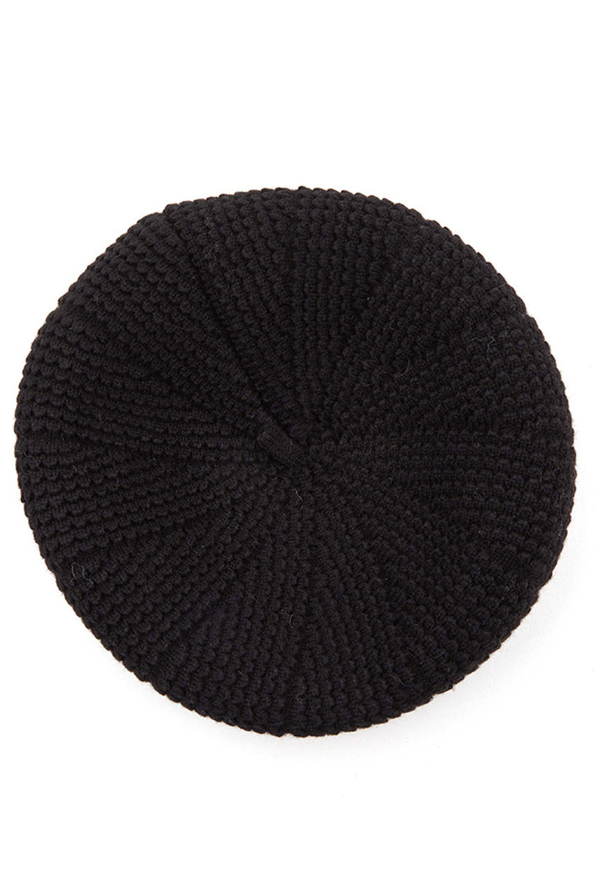 Black C.C. Scalloped Wave Pattern Beret features distinctive wave texturing for dimensional appeal. Precision-knit with premium materials for optimal comfort and durability. The classic beret silhouette with contemporary scalloped detailing offers versatile styling options for both casual and elevated looks.