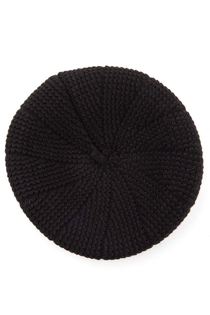 Black C.C. Scalloped Wave Pattern Beret features distinctive wave texturing for dimensional appeal. Precision-knit with premium materials for optimal comfort and durability. The classic beret silhouette with contemporary scalloped detailing offers versatile styling options for both casual and elevated looks.