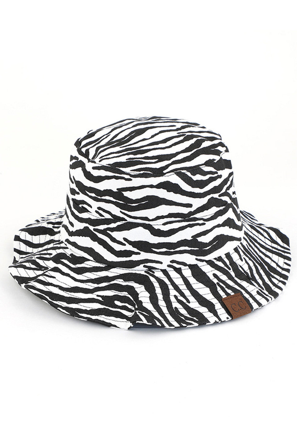 Black C.C. ZEBRA PRINT BUCKET HAT is the perfect accessory for any outdoor adventure. Made from high-quality materials, it offers both style and functionality. Stay protected from the sun and make a statement with its bold zebra print design. Trust in C.C. for expertly crafted hats.
