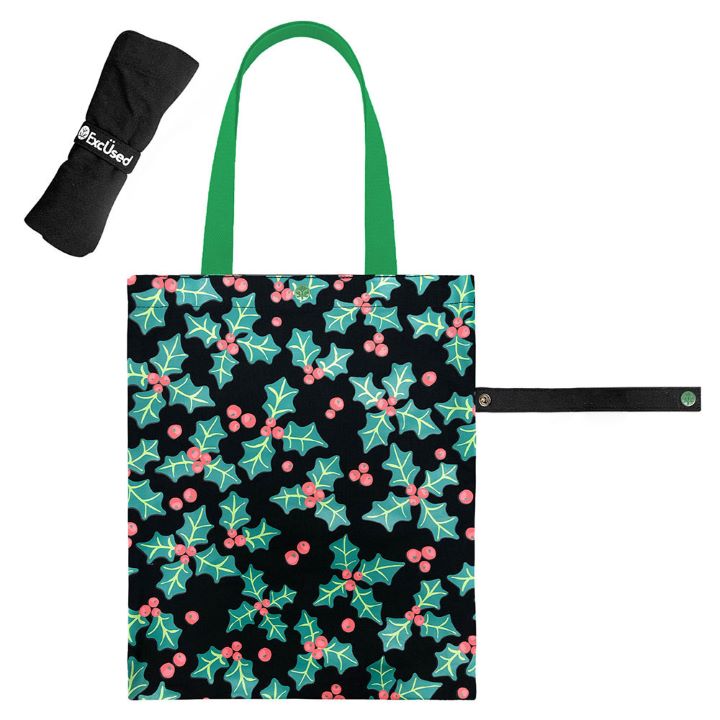 Reusable Christmas tote bag featuring a festive holly and berry print. Ideal for holiday shopping, gifting, or seasonal outings. Durable and stylish, it's a cheerful addition to your holiday essentials.