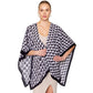 Black Geometric Pattern Print Ruana Poncho is a must-have addition to your wardrobe. Crafted with a unique geometric pattern, this poncho adds a touch of modern style to any outfit. Made with high-quality materials, it provides both comfort and durability. Perfect for any occasion, this versatile piece is a statement piece you won't miss out on. 