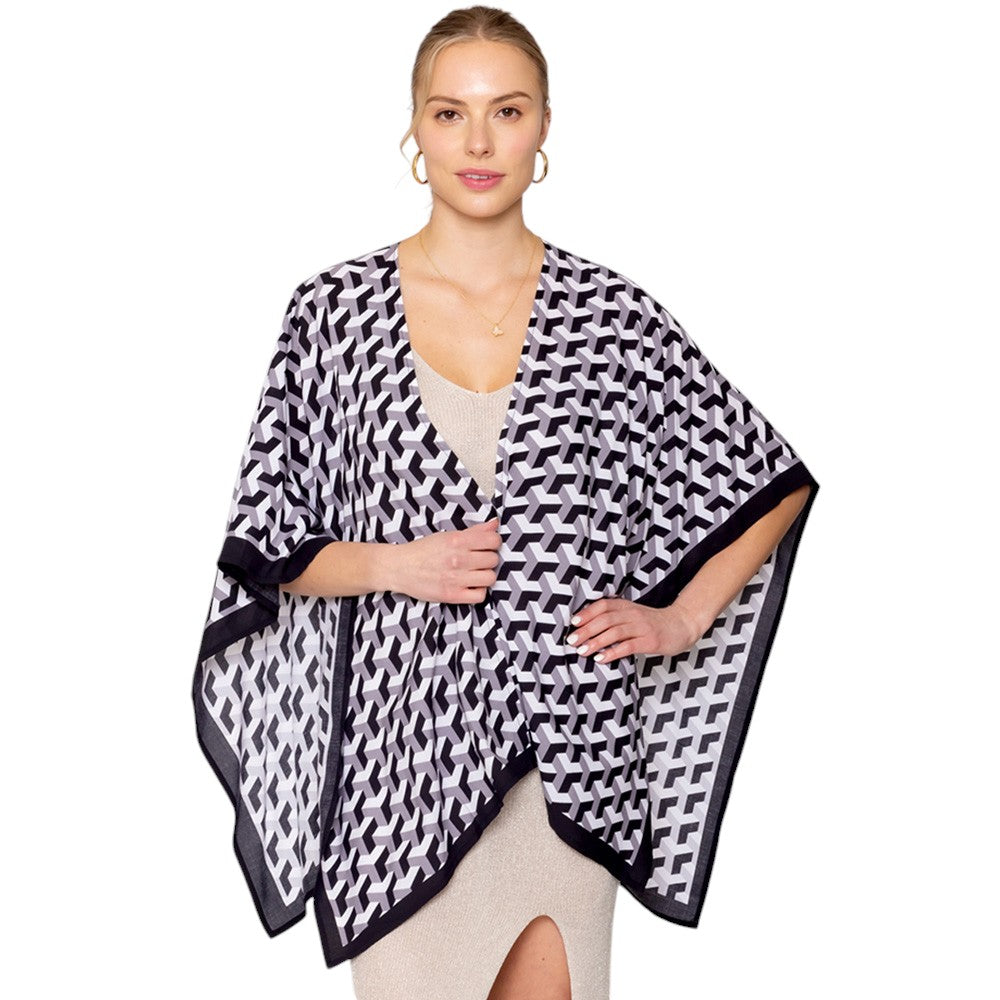 Black Geometric Pattern Print Ruana Poncho is a must-have addition to your wardrobe. Crafted with a unique geometric pattern, this poncho adds a touch of modern style to any outfit. Made with high-quality materials, it provides both comfort and durability. Perfect for any occasion, this versatile piece is a statement piece you won't miss out on. 