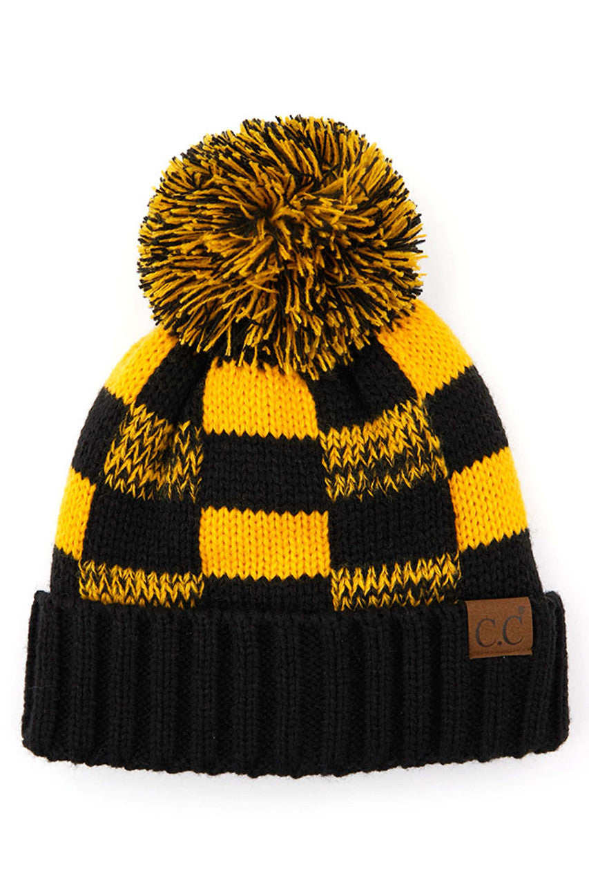 Black Gold C.C. Buffalo Check Beanie with Pom Hat combines technical performance with timeless design. Featuring a distinctive buffalo check pattern and decorative pom, this premium headwear delivers superior thermal retention while maintaining breathability. Precision-crafted construction ensures a comfortable fit that maintains shape through extended wear, making it an essential cold-weather accessory for the discerning customer. 