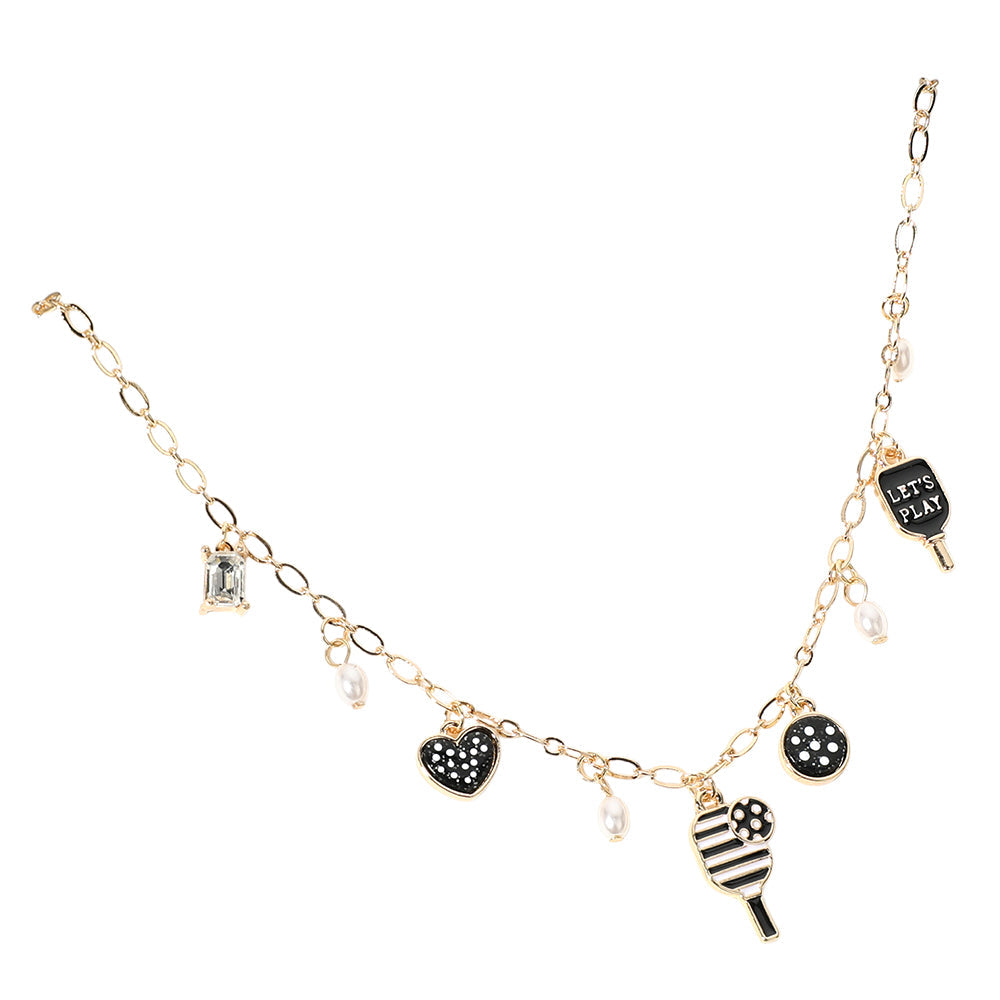 Black Gold White Let's Play Message Enamel Pickleball Pearl Charm Station Necklace is a must-have for any pickleball enthusiast. The stunning pearl charm and enamel design add a touch of elegance, while the "Let's Play" message promotes a sense of fun and camaraderie. Show off your love for this popular sport with style and grace.