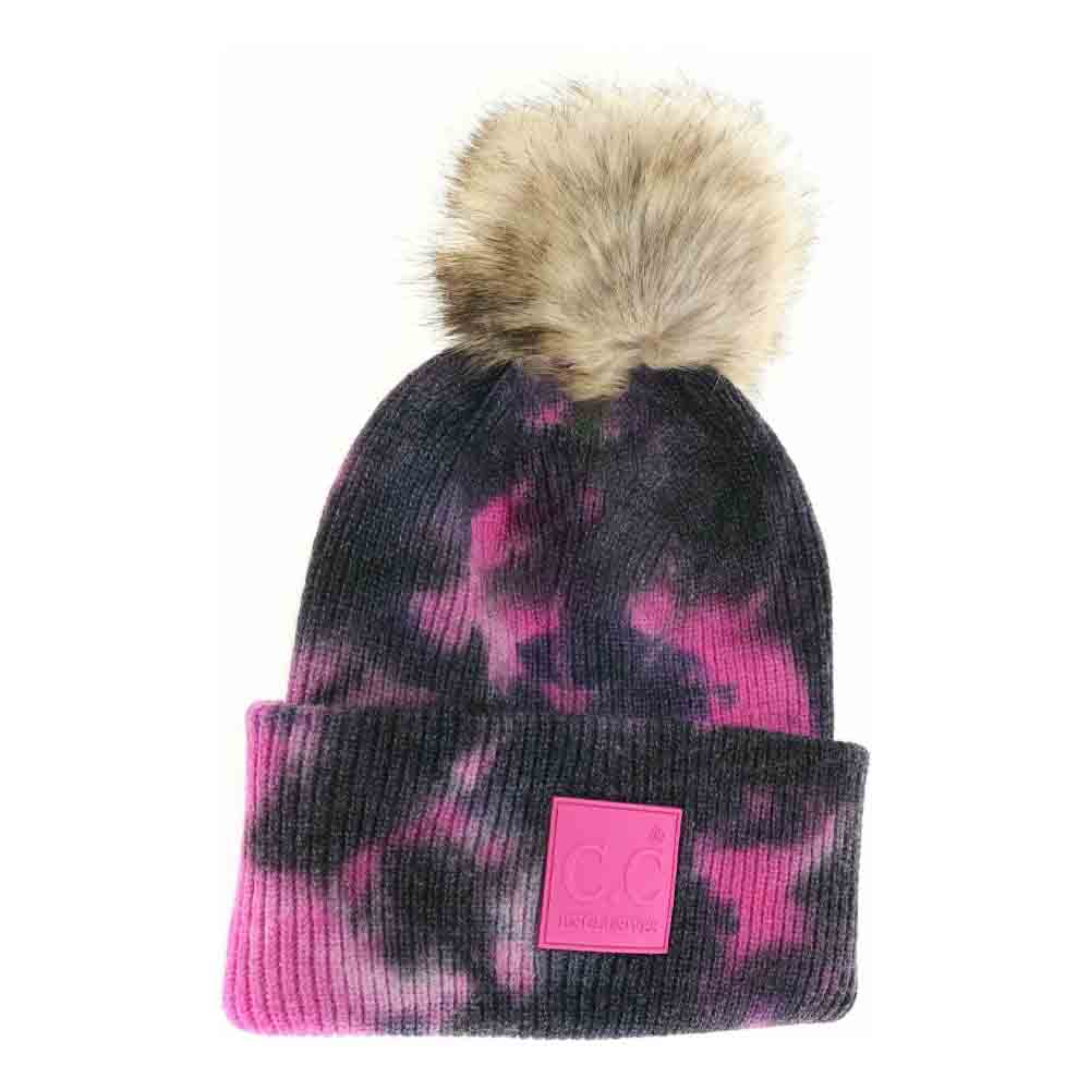 Black-HotPink-Tie Dye Fur Pom C.C Beanie seamlessly combines vibrant design with functional warmth. Expertly crafted, it features a unique tie-dye pattern and a luxurious fur pom that adds both texture and flair. Made from soft, stretchable materials, this beanie offers a comfortable, secure fit suitable for various head sizes. Ideal for cold weather, it elevates any winter wardrobe with its blend of fashion-forward style and practical insulation. 