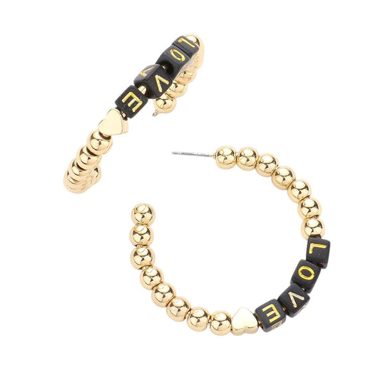 Black LOVE Metal Ball Half Hoop Message Earrings are a stylish addition to any outfit. The metal ball half hoop design adds a touch of modern flair, while the LOVE message adds a sweet and romantic touch. Crafted with high-quality materials, these earrings are both fashionable and durable. Perfect for any occasion.