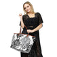 Black Palm Leaves Print Tote Bag, Experience the perfect blend of style and functionality with our tote fag. Crafted with a vibrant palm leaves print, this bag is not only visually appealing but also spacious enough to carry all your essentials. Made of high-quality materials, it ensures durability for your everyday use.